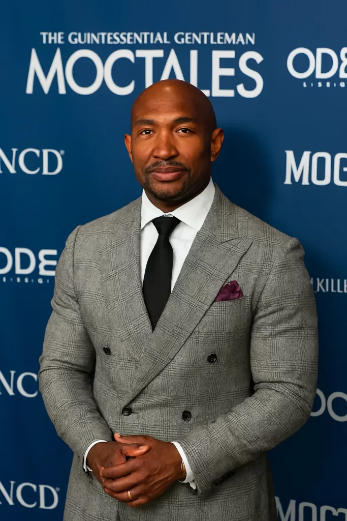Martell Holt posing with Shereé Whitfield and Markus Burns at the Upscale Magazine Reveal Party, highlighting his media presence and connections in the entertainment industry.